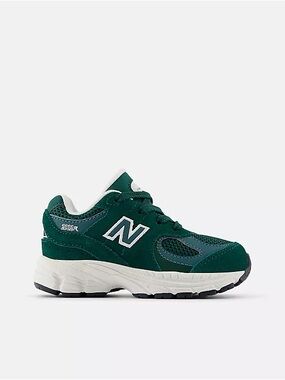 New Balance Kids 2002R Sneaker in Dark Green and White